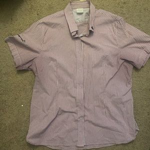 Disney store button up shirt. Possibly a cast member uniform.